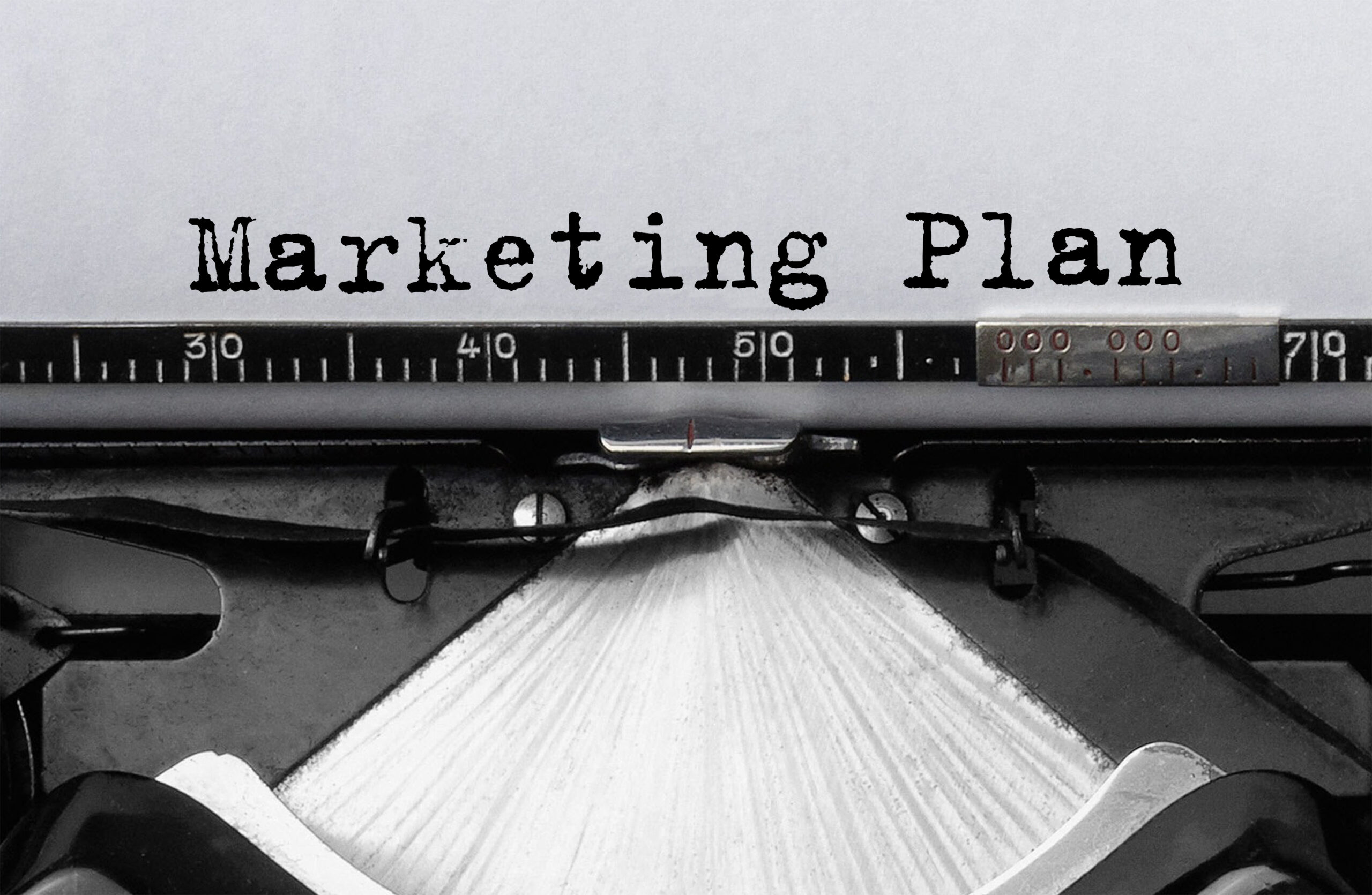 Text Marketing Plan typed on retro typewriter